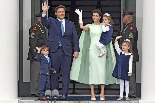 <p>Lynne Sladky/AP</p> Florida Gov. Ron DeSantis with his wife Casey and their three children