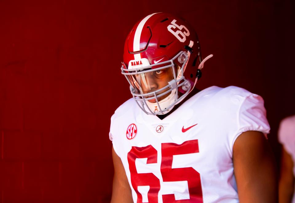 Sep 18, 2021; Gainesville, Florida, USA; Alabama Crimson Tide defensive lineman JC Latham (65) against the Florida Gators at Ben Hill Griffin Stadium. Mandatory Credit: Mark J. Rebilas-USA TODAY Sports