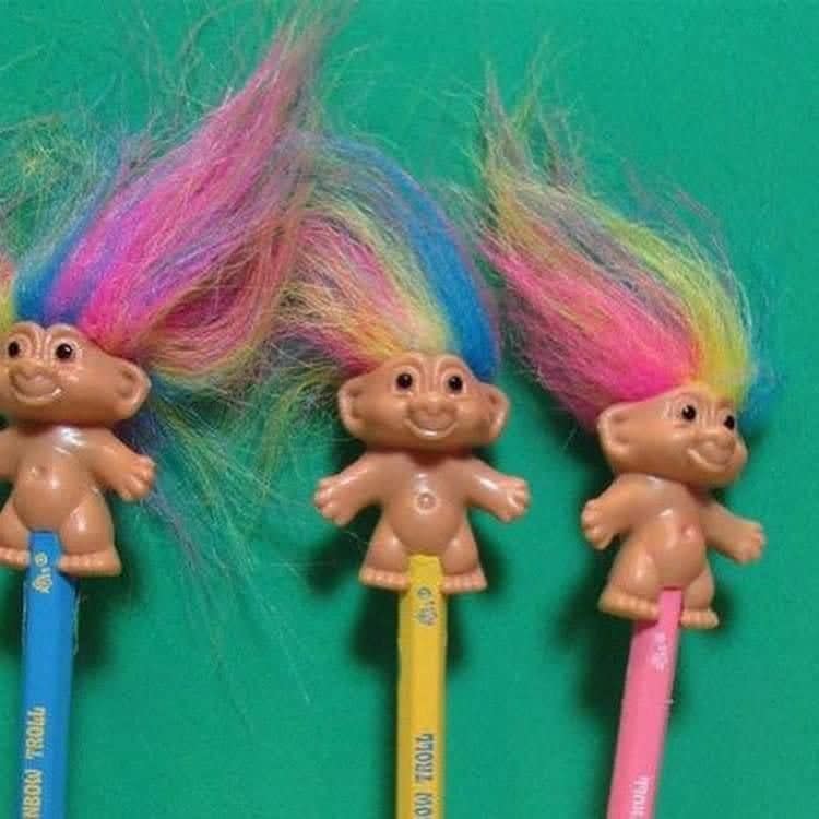 <p>Pencil toppers in general were really popular many years ago, but especially Troll doll pencil toppers. They were fun, quirky, and a little weird, and they basically didn't serve a purpose, but kids loved them. </p>