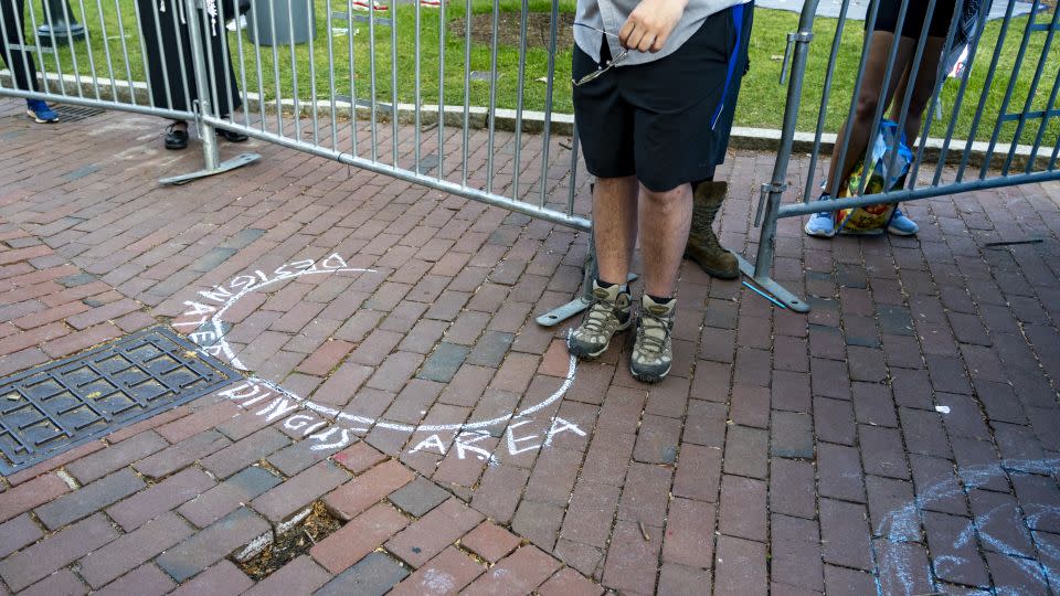 A circle drawn by a protester around the counter protester, labeled as the “Designated Dingus Area.” - Evelio Contreras/CNN