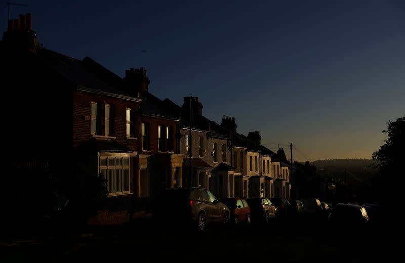 FILE PHOTO: A row of residential houses are seen during sunrise in London