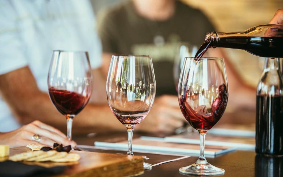 Fine wine is a good long-term investment - but you'll need to avoid temptation and leave the bottles untouched for a few years - Getty Images Contributor