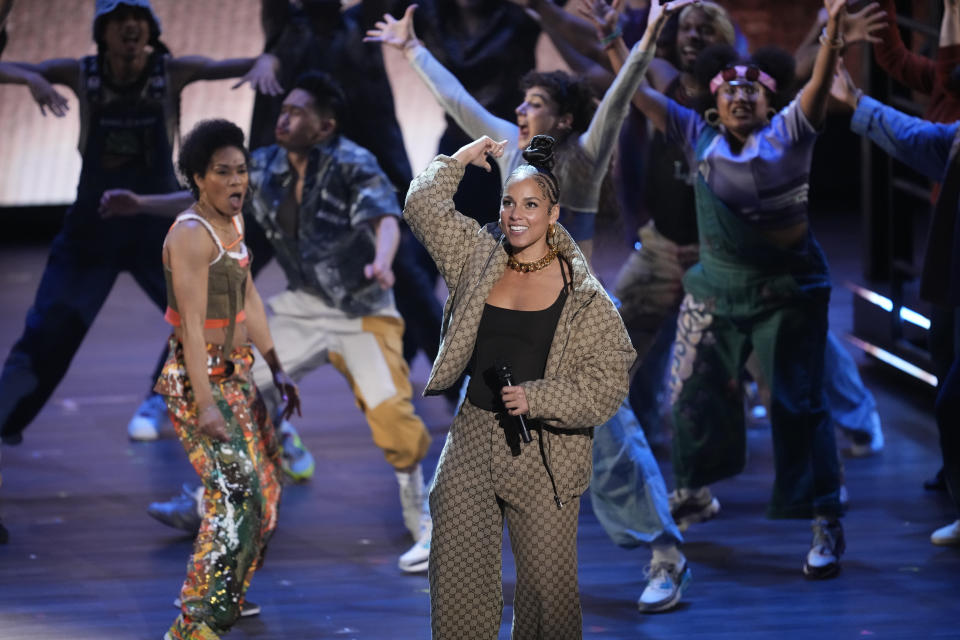 Alicia Keys performs with members of the company of "Hell's Kitchen" during the 77th Tony Awards on Sunday, June 16, 2024, in New York. (Photo by Charles Sykes/Invision/AP)