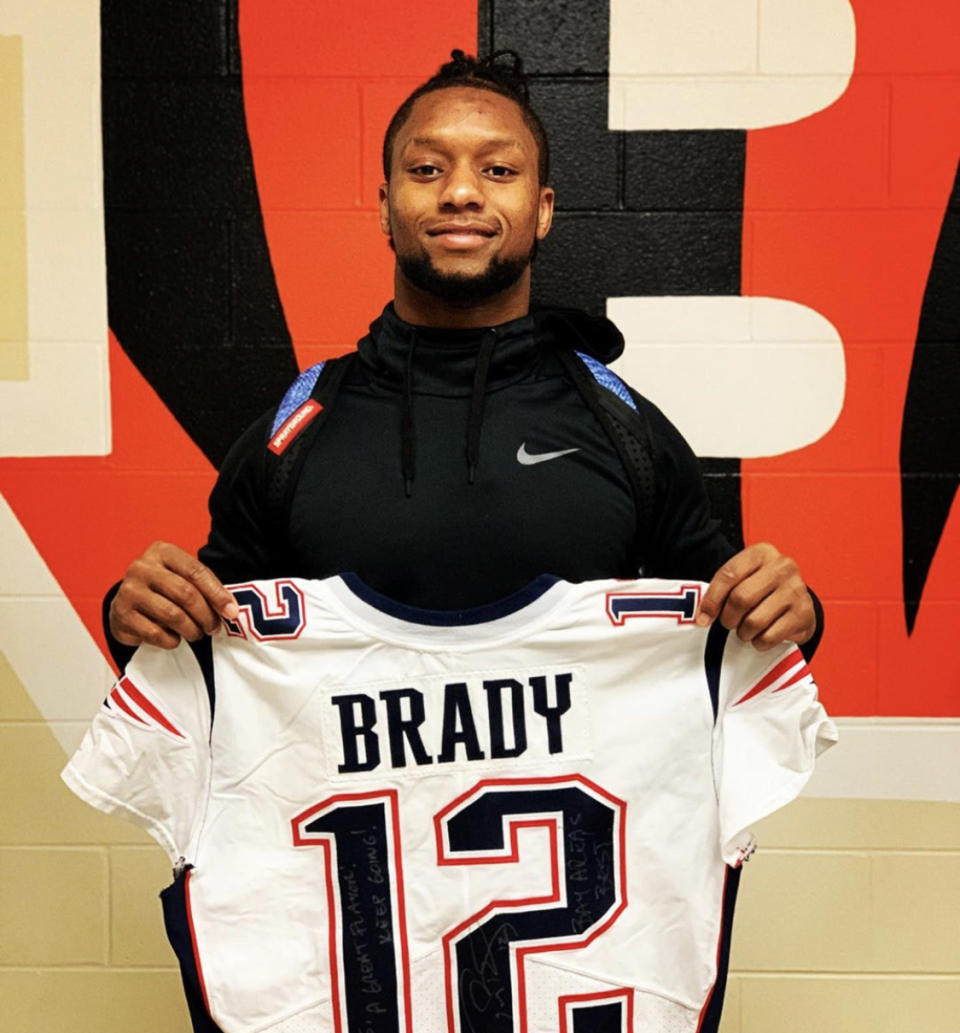 Joe Mixon and his new Brady jersey. (Mixon/Instagram)