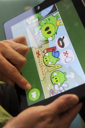 "Bad Piggies", the newest game launched by Finnish Rovio Entertainment, is played on a tablet in Helsinki. "Angry Birds" maker Rovio launched the new title allowing users to play as the "Bad Piggies" from the smash-hit game, and take revenge on the birds who attacked them with slingshots