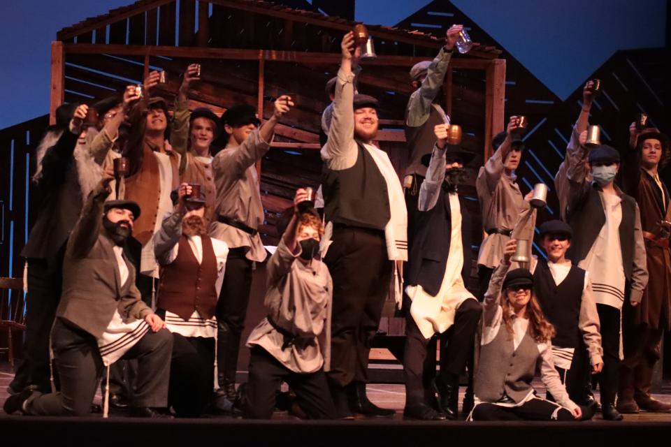 The Tecumseh Youth Theatre cast performs "To Life" in their production of "Fiddler on the Roof" at the Tecumseh Center for the Arts.