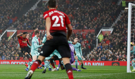 Soccer Football - Premier League - Manchester United v Arsenal - Old Trafford, Manchester, Britain - December 5, 2018 Manchester United's Anthony Martial scores their first goal Action Images via Reuters/Carl Recine