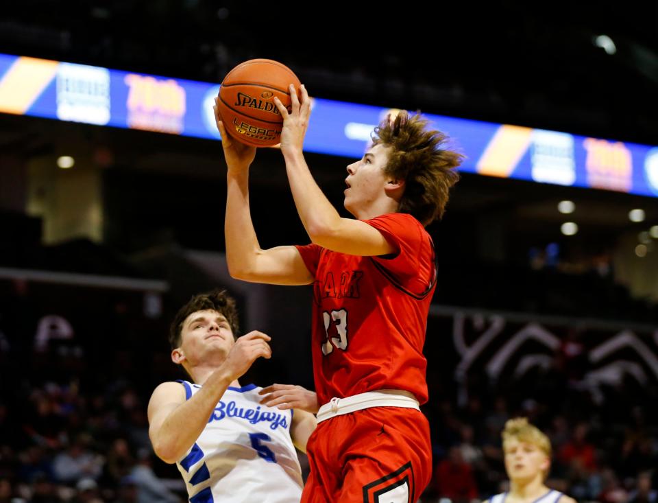 Ozark's Kylan Pickren tosses up a basket as the Tigers took on the Clever Bluejays in the first round of the Gold Division during the Blue and Gold Tournament at Great Southern Bank Arena on Tuesday, Dec. 26, 2023.