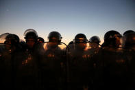 Security forces face protesters during a demonstration outside the gates of the Eden Rock Resort development, on the south end of Ramlet al Bayda beach, Beirut, Lebanon, November 26, 2016. Sally Hayde/Thomson Reuters Foundation via REUTERS