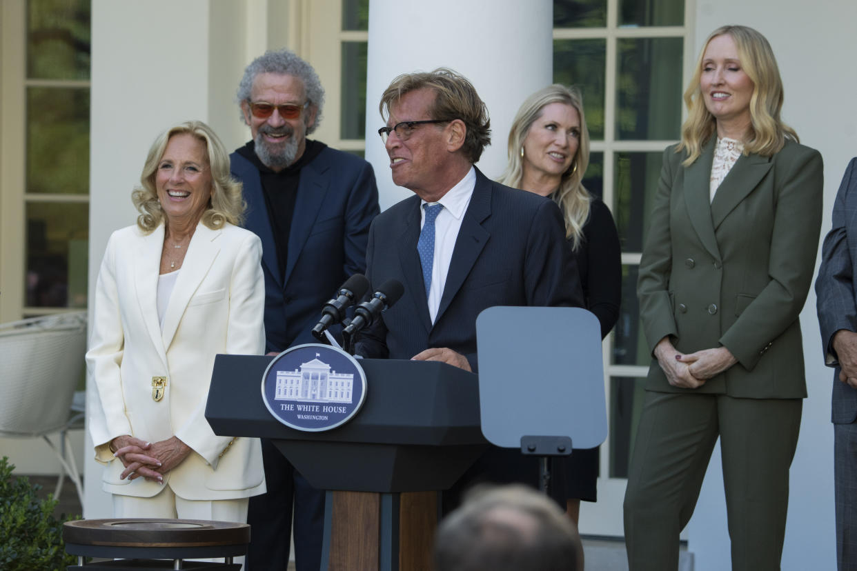 First lady Jill Biden, listens to actor Aaron Sorkin speaks at an event on the Rose Garden at the White House to mark the 25th anniversary of the television series, The West Wing, Friday, Sept. 20, 2024, in Washington. (AP Photo/Manuel Balce Ceneta)