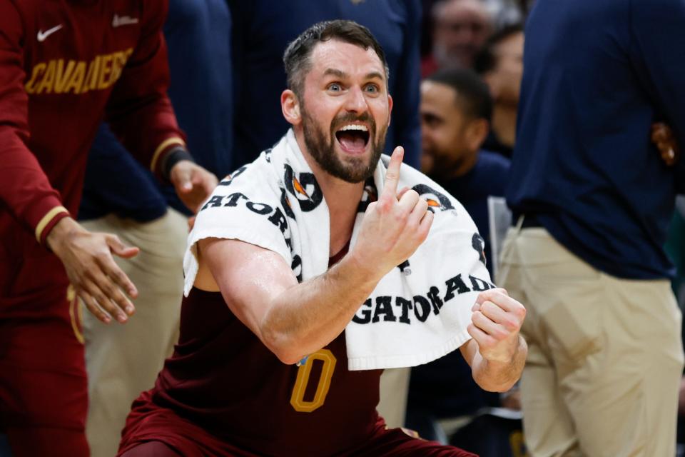 Cleveland Cavaliers forward Kevin Love celebrates during overtime of an NBA basketball game against the Chicago Bulls, Monday, Jan. 2, 2023, in Cleveland. (AP Photo/Ron Schwane)