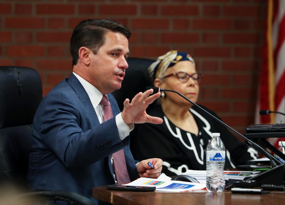 Jefferson County Public Schools Superintendent Marty Pollio, left, explained his support of the proposed overhaul of the student assignment plan as Board of Education Chair Diane Porter looked on at the Vanhoose Education Center in Louisville, Ky. on June 1, 2022.  The board voted unanimously to approve a new plan.