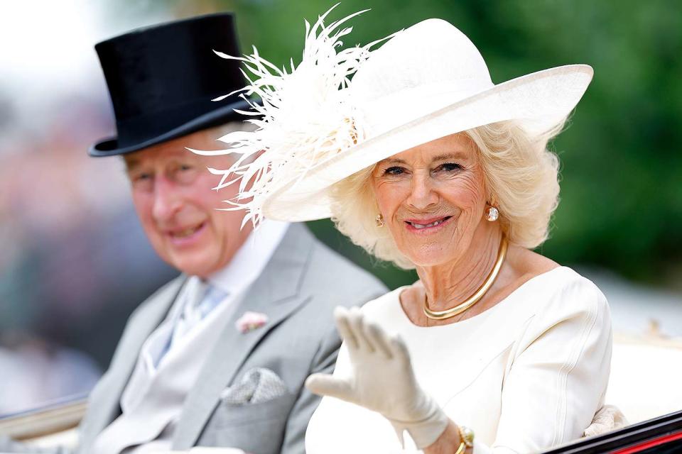 <p>Max Mumby/Indigo/Getty</p> King Charles and Queen Camilla attend the 2023 Royal Ascot.