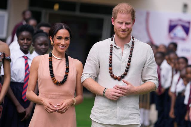 <p>AP Photo/Sunday Alamba</p> Meghan Markle and Prince Harry at Lightway Academy in Abuja, Nigeria, on May 10, 2024.