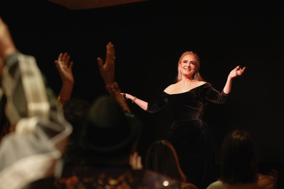 Adele is there with your reminder: Never throw objects at the performer on stage.