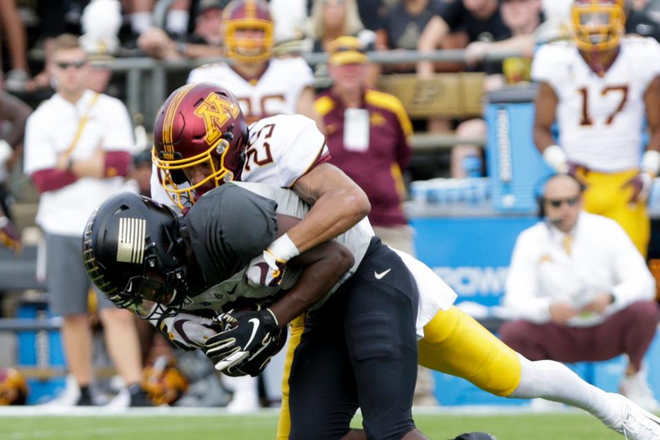 Minnesota defensive back Benjamin St-Juste (25) tackles Purdue wide receiver David Bell (3) during the second quarter of a NCAA football game, Saturday, Sept. 28, 2019 at Ross-Ade Stadium in West Lafayette.