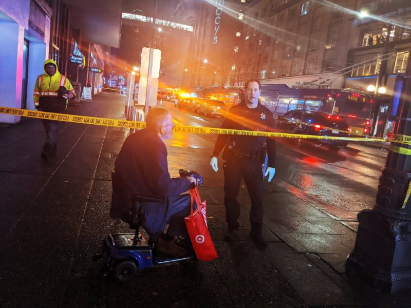 Police block a road following a shooting in Seattle