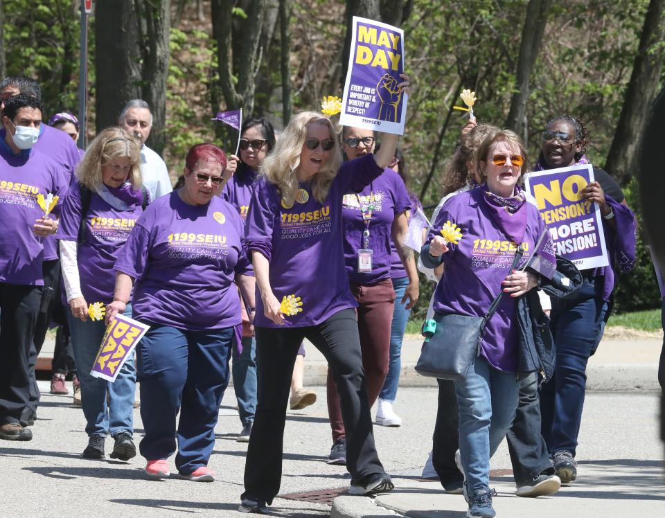 Registered nurses and other workers represented by 1199SEIU rally outside Phelps Memorial Hospital in Sleepy Hollow May 1, 2024. The workers there unionized in June 2022 and 18 months later continue to work toward a contract.