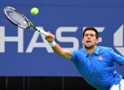 Novak Djokovic of Serbia hits to Jerzy Janowicz of Poland on day one of the 2016 U.S. Open tennis tournament at USTA Billie Jean King National Tennis Center. Mandatory Credit: Robert Deutsch-USA TODAY Sports