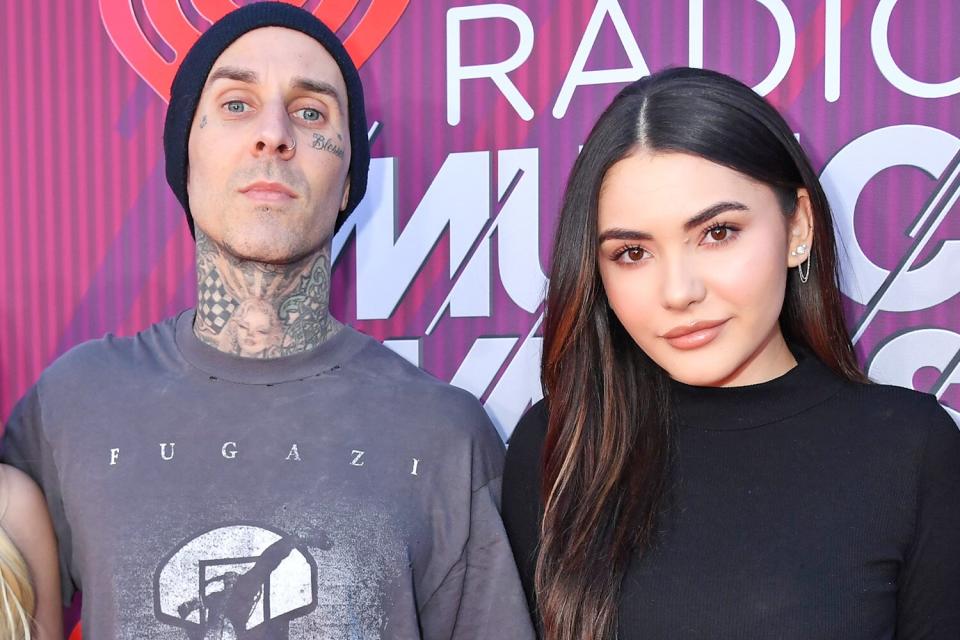 LOS ANGELES, CALIFORNIA - MARCH 14: (EDITORIAL USE ONLY. NO COMMERCIAL USE) (L-R) Alabama Barker, Travis Barker, Atiana De La Hoya and Landon Asher Barker attends the 2019 iHeartRadio Music Awards which broadcasted live on FOX at Microsoft Theater on March 14, 2019 in Los Angeles, California. (Photo by Jeff Kravitz/2019 iHeartMedia)