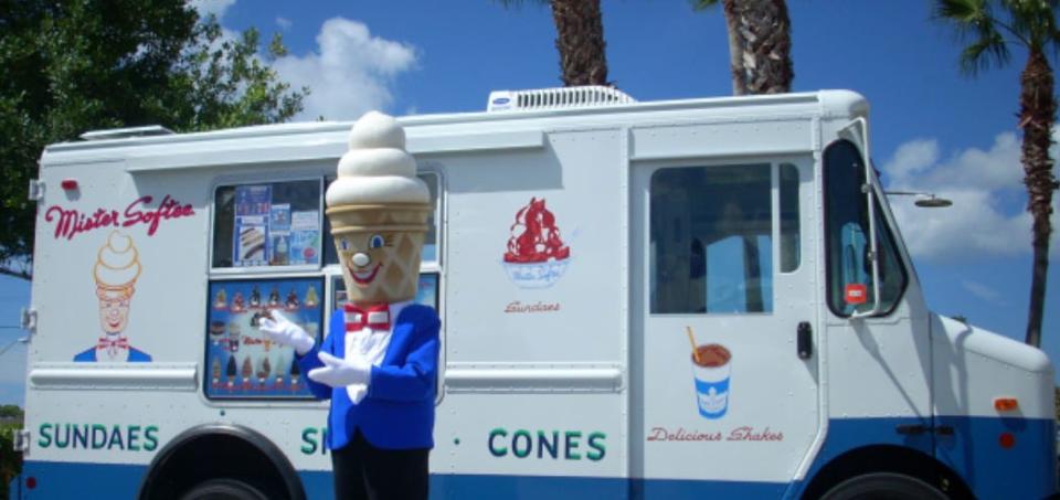 Mister Softee mascot stands in front of the classic box truck. For fans, the company's familiar jingle has been a soundtrack to summer since 1960.
