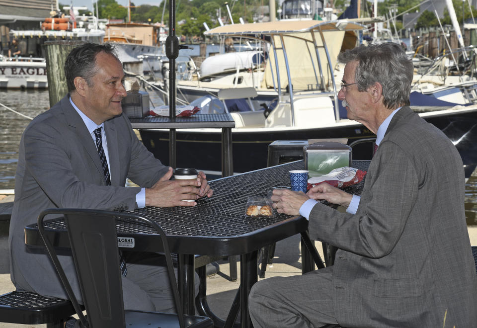 Maryland Attorney General Brian Frosh, right, meets with Doug Emhoff, husband of Vice President Kamala Harris, at the Bread and Butter Kitchen, in Annapolis, Md., on Tuesday, May 18, 2021. (Paul W. Gillespie/The Baltimore Sun via AP)