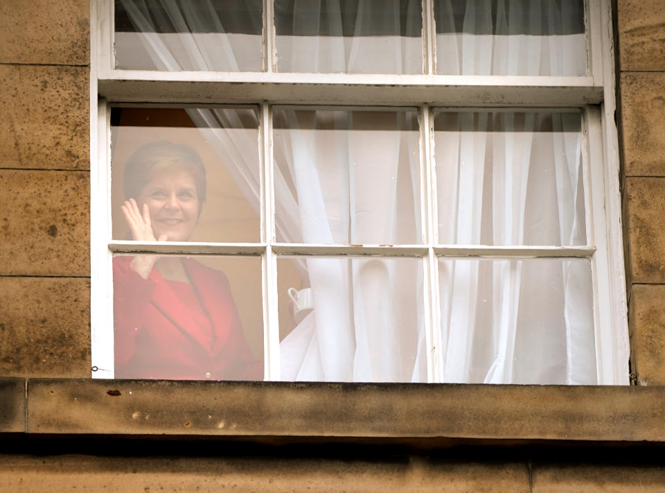 First Minister Nicola Sturgeon waves to members of the public outside Bute House in Edinburgh after she announced during a press conference that she will stand down as First Minister for Scotland after eight years. Picture date: Wednesday February 15, 2023. (Photo by Andrew Milligan/PA Images via Getty Images)