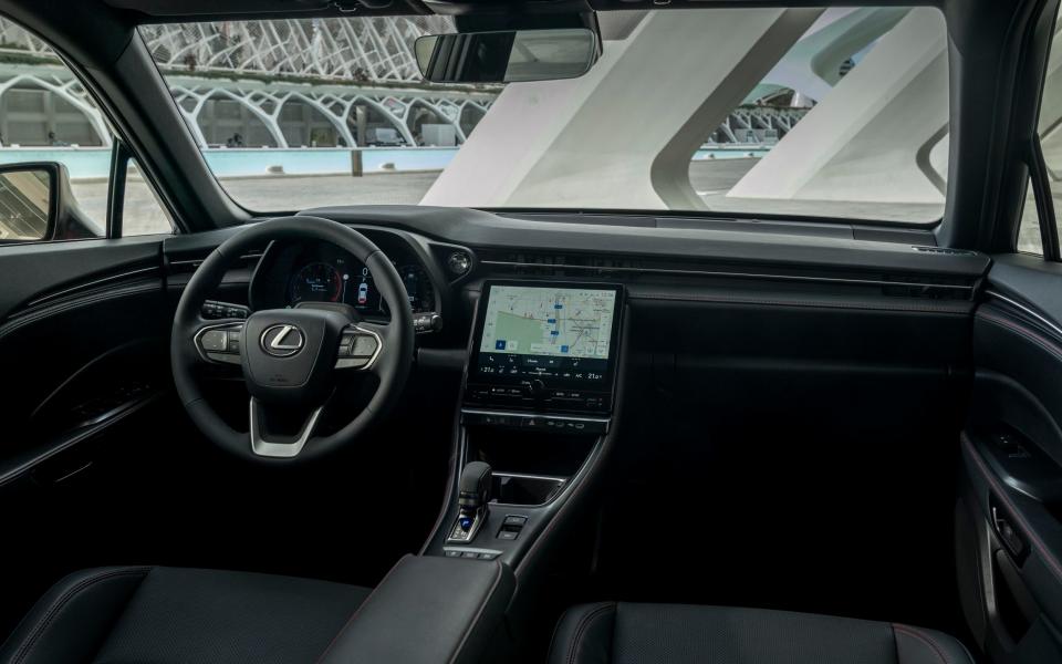 Strong, horizontal lines and plenty of cushy, leather cladding give the dash a premium finish