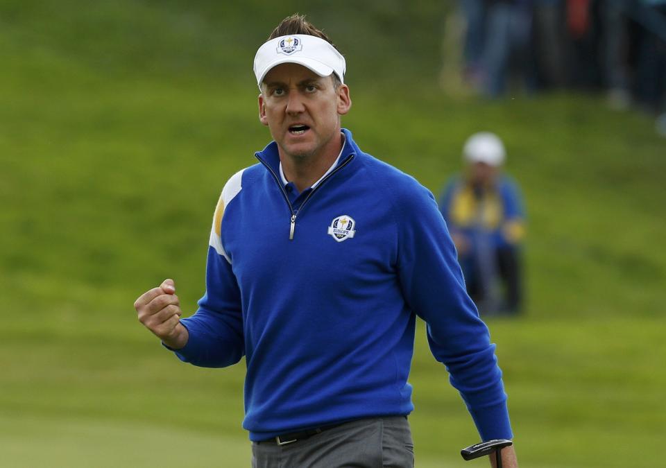 European Ryder Cup player Ian Poulter celebrates going one up on the eighth hole during the 40th Ryder Cup singles matches at Gleneagles in Scotland September 28, 2014. REUTERS/Russell Cheyne (BRITAIN - Tags: SPORT GOLF)