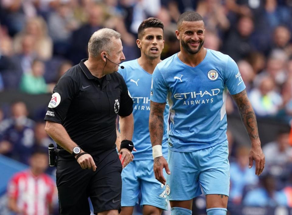 Refeee Jon Moss reprieved Kyle Walker after initially showing him the red card (Martin Rickett/PA) (PA Wire)