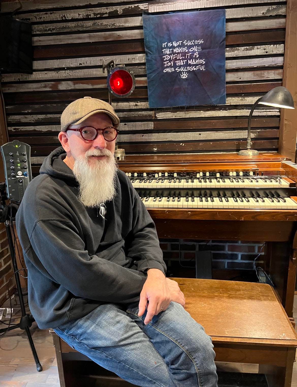 Ron Flack, owner of Realgrey Records, is shown inside the studio in Canton. Realgrey will hold an open house from 2 to 8 p.m. Sunday marking the addition of a new recording room.