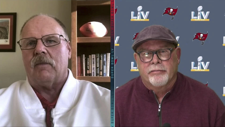 In this still image from video provided by the NFL, Kansas City Chiefs head coach Andy Reid, left, and Tampa Bay Buccaneers head coach Bruce Arians speak during Super Bowl 55 Opening Night, Monday, Feb. 1, 2021. (NFL via AP)