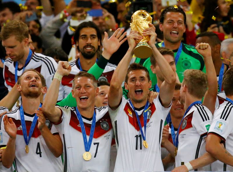 FILE PHOTO: Germany's Klose lifts the World Cup trophy after winning the 2014 World Cup final against Argentina in Rio de Janeiro