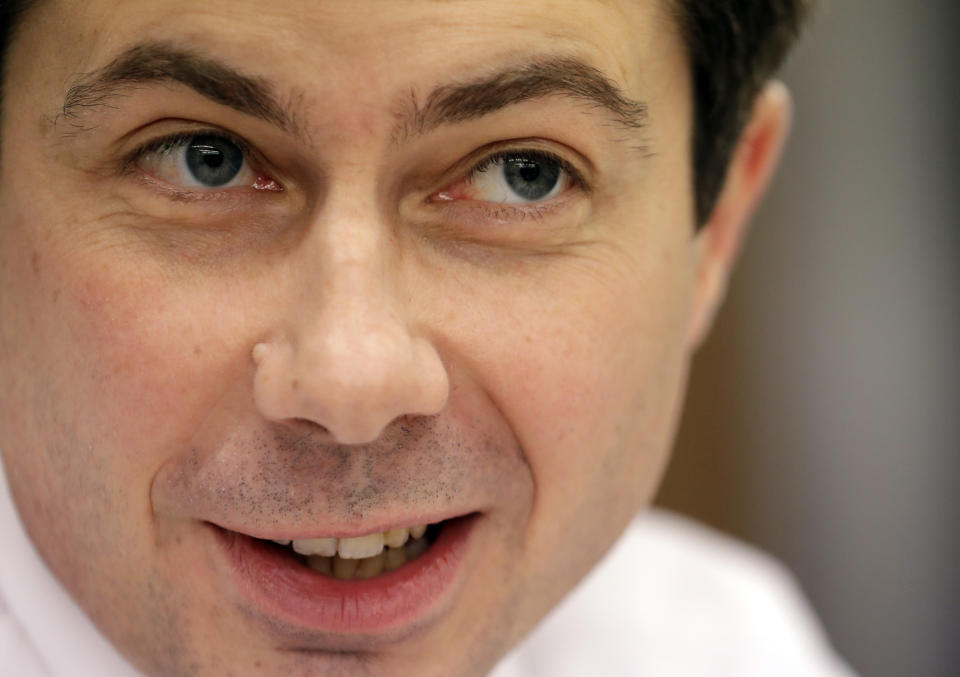 Mayor Pete Buttigieg talks with an AP reporter at Farmers Market in South Bend, Ind., Thursday, Jan. 10, 2019. Few people know Buttigieg's name outside the Indiana town where he's mayor, but none of that has deterred him from contemplating a 2020 Democratic presidential bid. He's among the potential candidates who believe 2016 and 2018 showed voters are looking for fresh faces. (AP Photo/Nam Y. Huh)