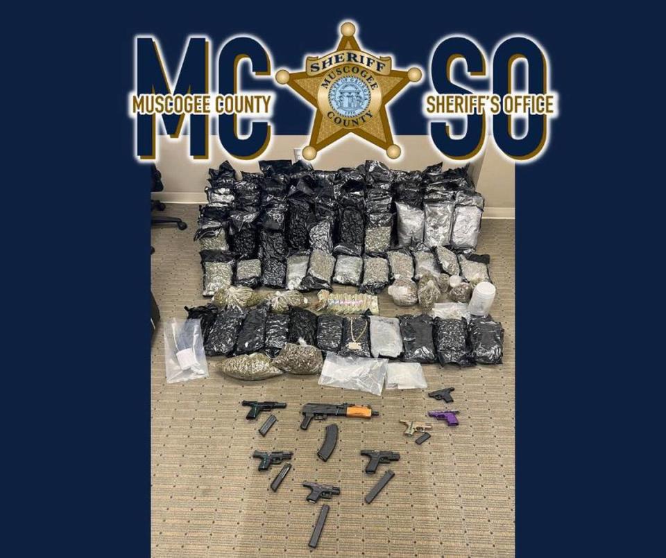 A picture of drugs, guns and cash seized by the Muscogee County Sheriff’s Office through multiple search warrants in Muscogee County. Chelsey Brooks/Photo courtesy of the Muscogee County Sheriff's Office Facebook page.