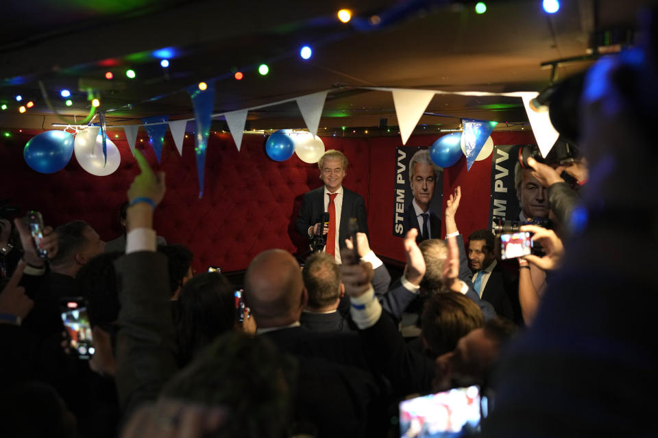 Geert Wilders, leader of the Party for Freedom, known as PVV, smiles as he addresses the first preliminary results of general elections in The Hague, Netherlands, Wednesday, Nov. 22, 2023. (AP Photo/Peter Dejong)