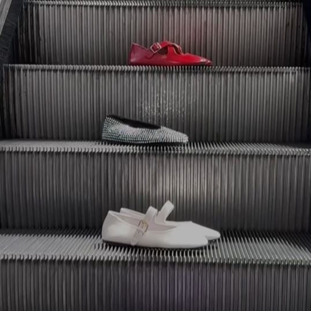  Tony Bianco shoes on an escalator. 