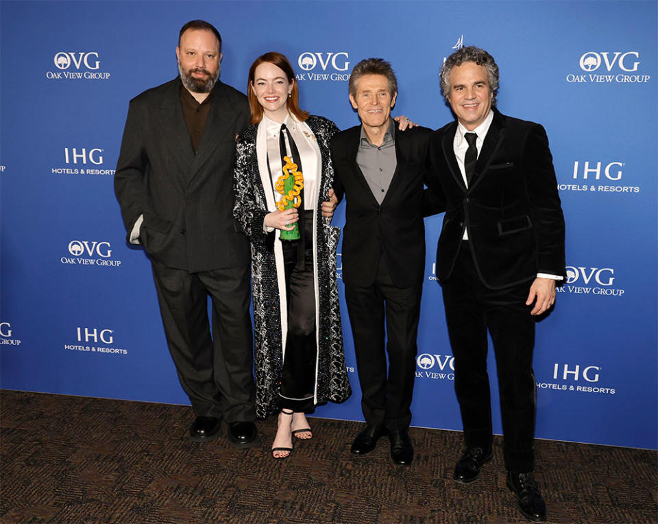 Yorgos Lanthimos, Emma Stone, winner of the Desert Palm Achievement Award, Willem Dafoe and Mark Ruffalo pose in the press room during the 2024 Palm Springs International Film Festival Film Awards at Palm Springs Convention Center on January 04, 2024 in Palm Springs, California.