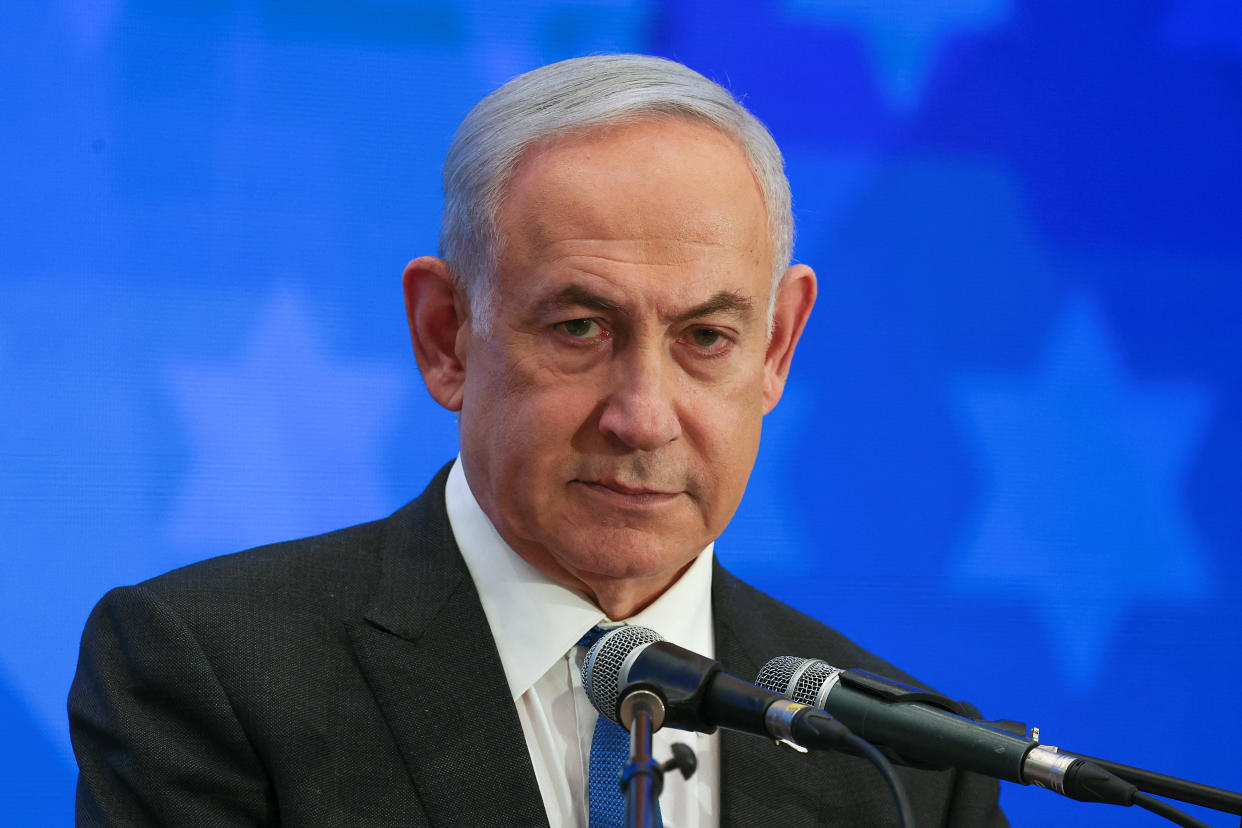 Israeli Prime Minister Benjamin Netanyahu addresses the Conference of Presidents of Major American Jewish Organizations, amid the ongoing conflict between Israel and the Palestinian Islamist group Hamas, in Jerusalem, February 18, 2024. REUTERS/Ronen Zvulun