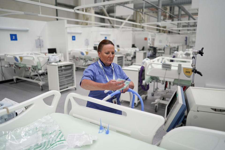 SUNDERLAND, ENGLAND - MAY 04: Lynda Pittilla, Lead ICU Nurse at Nightingale North East prepares equipment for a ventilator in ICU ward 1 at the new NHS Nightingale North East hospital opened in response to the coronavirus pandemic on May 04, 2020 in Sunderland, United Kingdom. The formal opening will take place on May 5 with Her Royal Highness the Countess of Wessex opening the hospital by video link. The new NHS Nightingale hospital will be operated by Newcastle Upon Tyne Hospitals Foundation Trust. The hospital will have 460-beds to treat patients and will have equipment to support patients who require ventilation. Based at the Washington International Advanced Manufacturing Park (IAMP) development the building was to be used as part of the region’s advanced manufacturing sector until used as a temporary hospital. The country continues quarantine measures intended to curb the spread of Covid-19, but the infection rate is falling, and government officials are discussing the terms under which it would ease the lockdown. (Photo by Ian Forsyth/Getty Images)