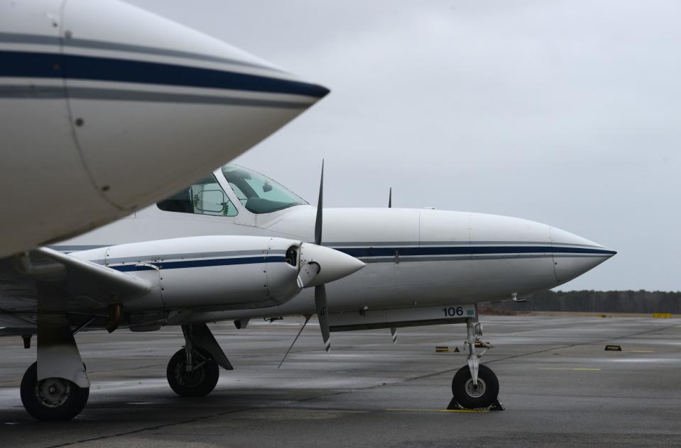 Cape Air Cessna 402 planes are parked on the north ramp at the Cape Cod Gateway Airport in Hyannis, where runway and taxiway improvements are part of a 20-year master plan.