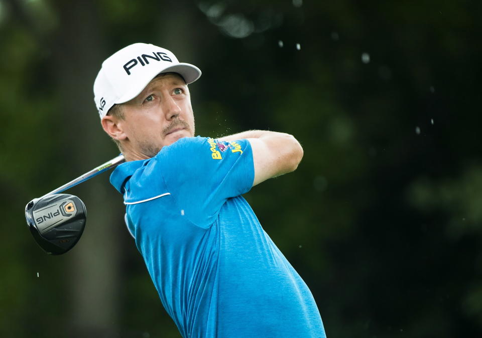 Mackenzie Hughes watches his tee shot on the second hole during the first round of the the Canadian Open golf tournament at Glen Abbey in Oakville, Ontario, Thursday, July 26, 2018. (Nathan Denette/The Canadian Press via AP)