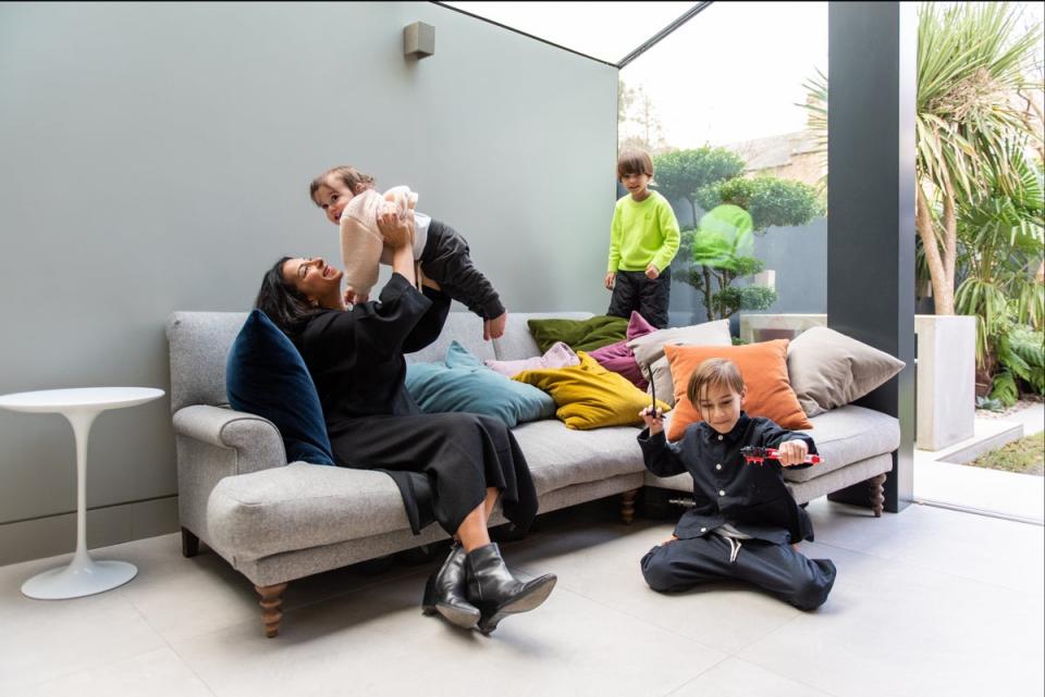 A wraparound extension with a glass-pitched side return doubled the width of the kitchen, bringing daylight much deeper into the home (Joseph Traylen)