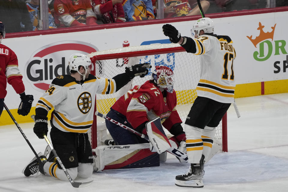 Boston Bruins left wing Jake DeBrusk (74) gestures after scoring a goal against Florida Panthers goaltender Sergei Bobrovsky (72) during the second period of Game 4 of an NHL hockey Stanley Cup first-round playoff series, Sunday, April 23, 2023, in Sunrise, Fla. (AP Photo/Marta Lavandier)