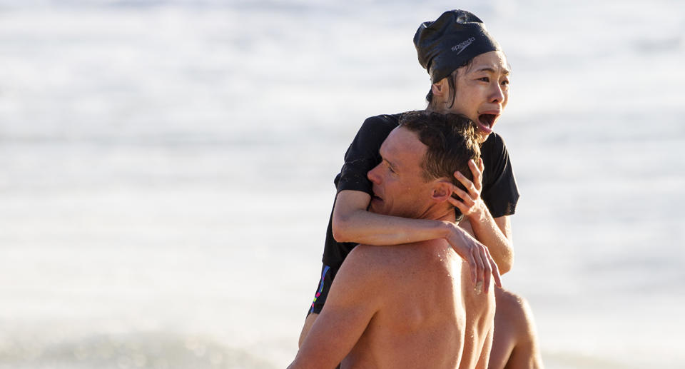 The woman was caught under 10ft waves at Bronte Beach before being saved by Bondi Rescue Lifeguards