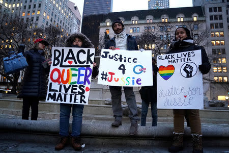 FILE PHOTO: People attend a rally in support of actor Jussie Smollett in the Manhattan borough of New York City, New York, U.S., February 1, 2019. REUTERS/Carlo Allegri