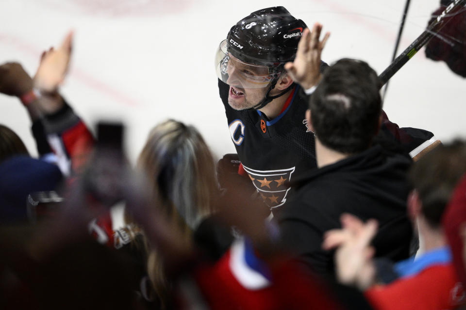 Washington Capitals left wing Alex Ovechkin (8) celebrates his goal during the first period of an NHL hockey game against the Winnipeg Jets, Friday, Dec. 23, 2022, in Washington. This was Ovechkin's 801st NHL goal. (AP Photo/Nick Wass)