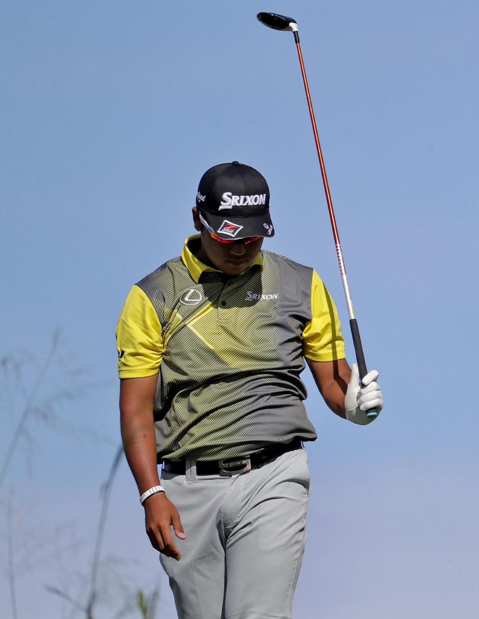 Hideki Matsuyama, of Japan, reacts to his shot from the 12th tee during the second round of the Tournament of Champions golf event, Friday, Jan. 6, 2017, at Kapalua Plantation Course in Kapalua, Hawaii. (AP Photo/Matt York)