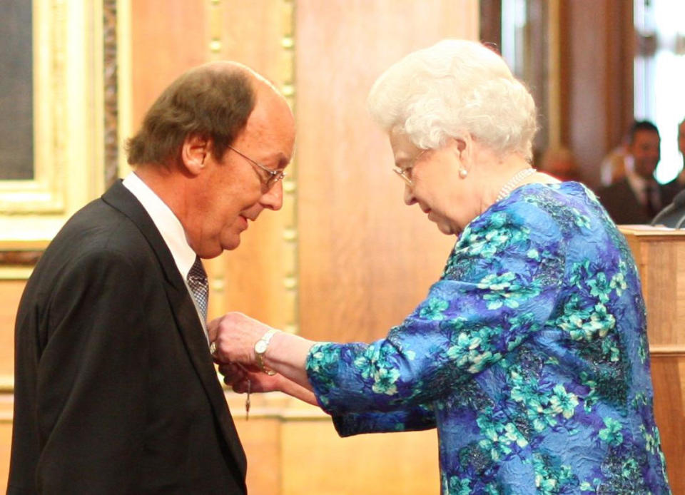 TV Presenter Fred Dinenage during an Investiture ceremony at Windsor Castle where he was made a Member of the British Empire (MBE) by Queen Elizabeth II.