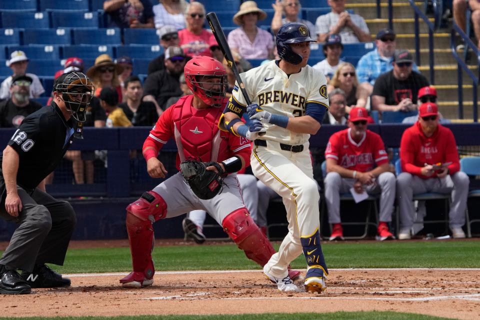 Brewers second baseman Brice Turang hits an RBI double against the Angels in a spring training game. Turang has added about 20 pounds since last season.